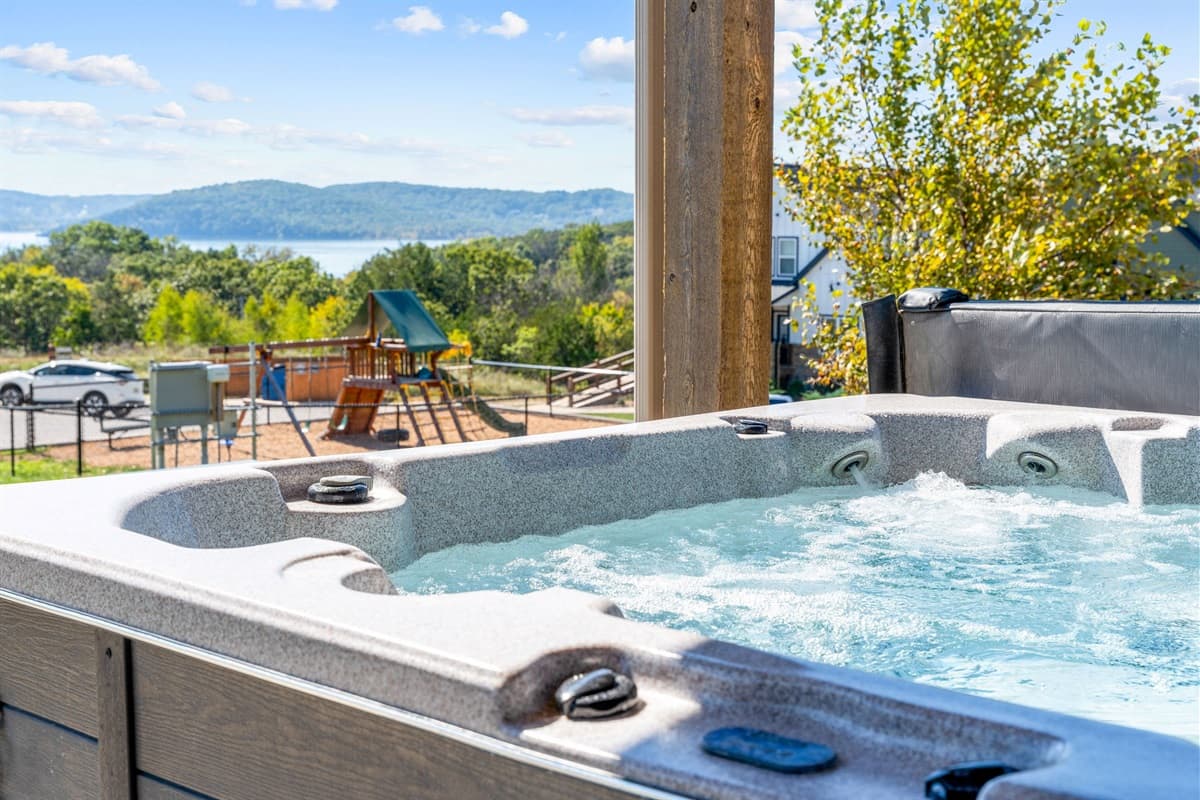 Jump in the hot tub after getting out of the community pool steps away!