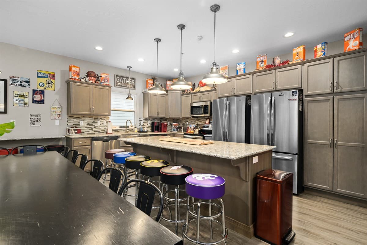 2 kitchens on main and lower floor. 3 total refrigerators in this home.