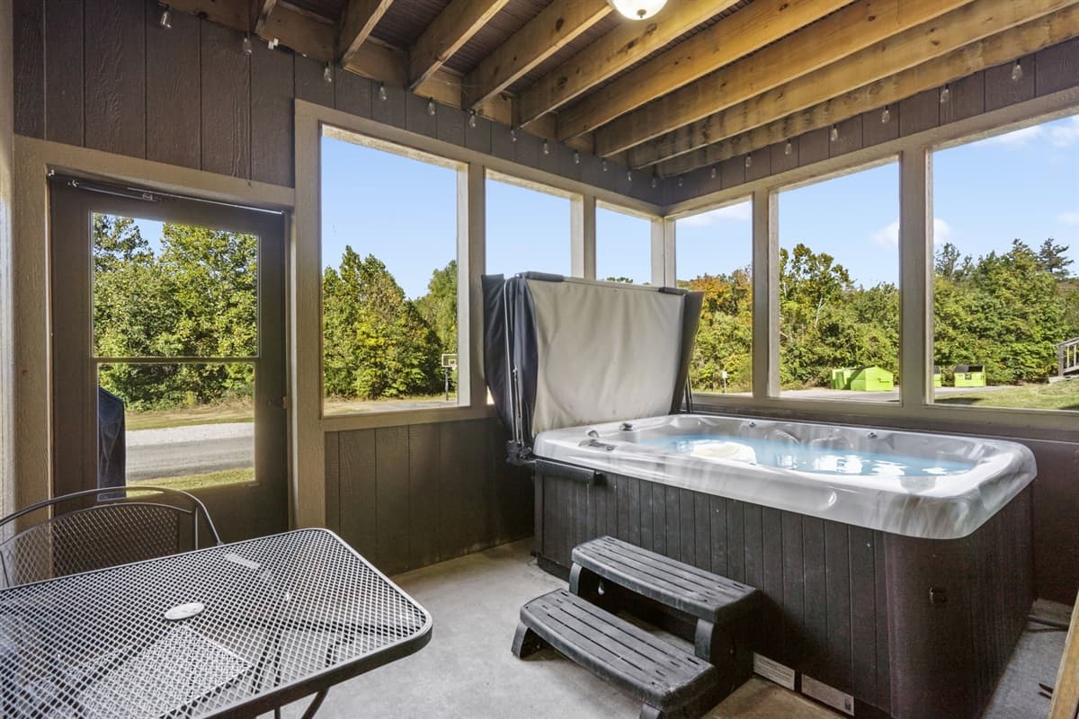 Private Hot Tub inside a screened in porch!