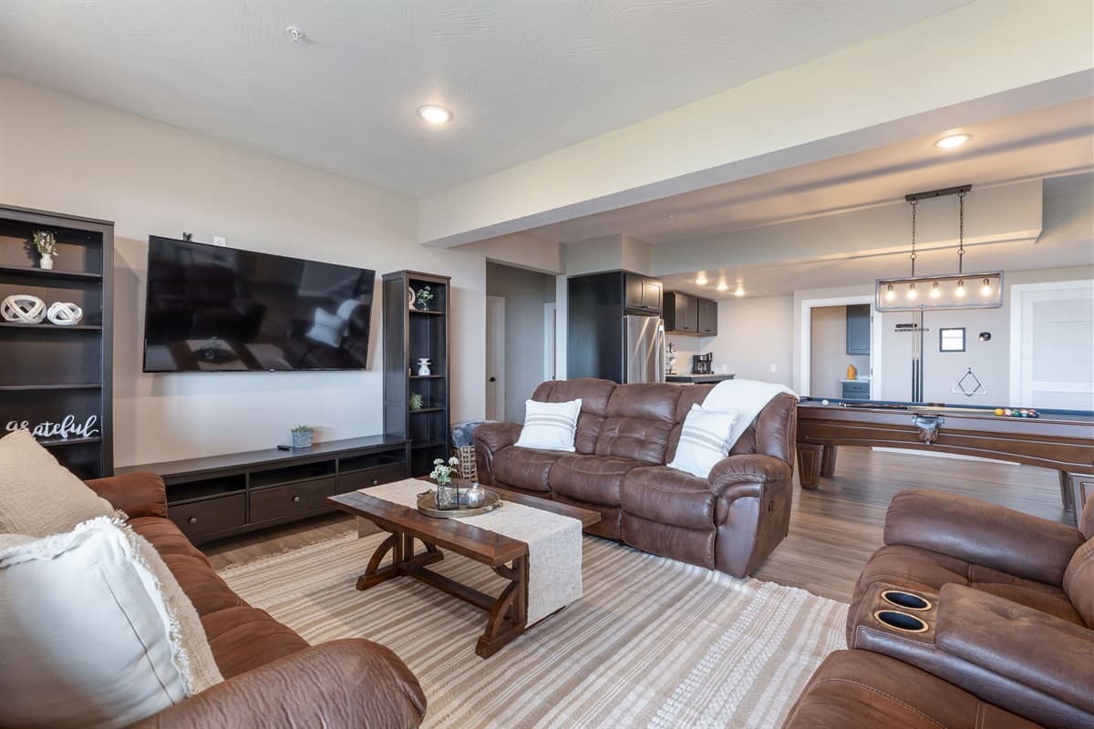 Lower level entertainment space with all kinds of space!