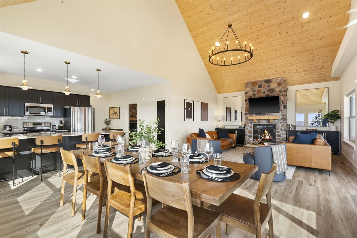 Main living spaces are on the upper floor of this home: Open kitchen with dining seating for the whole family!