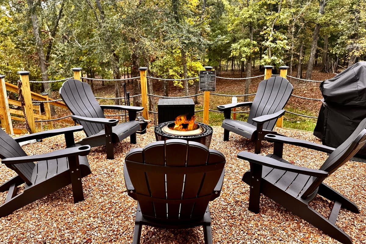 Outdoor fire pit with seating and grill