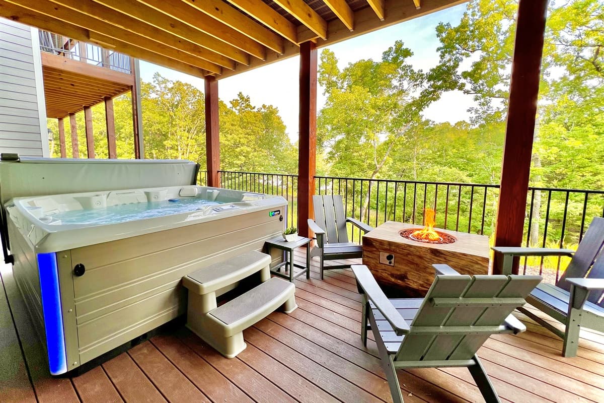 Lower deck complete with private hot tub and fire pit for you to enjoy!
