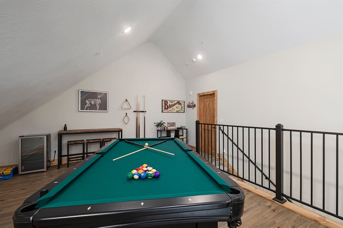 Pool table and mini fridge upstairs!