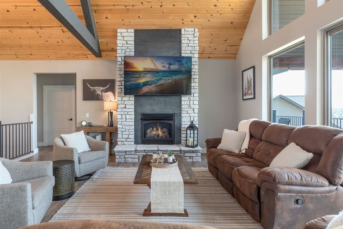 Main level living room with electric fireplace!