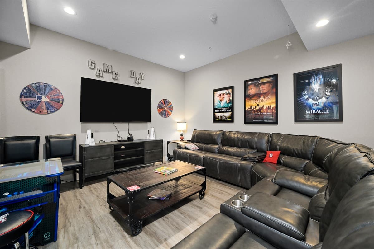 Cheer on your favorite team on this 75" TV and comfortable sectional